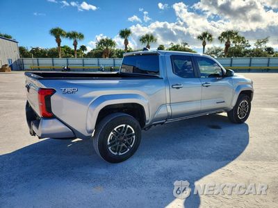 Trzecie zdjęcie samochodu z tyłu: 2026 TOYOTA TACOMA TRD SPORT VIN:3TMLB5FNXTM081825 - miniatura
