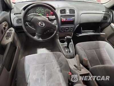 Zdjęcie 8 z 12 samochodu: 2003 MAZDA PROTEGE DX VIN:JM1BJ225330156922 - miniatura