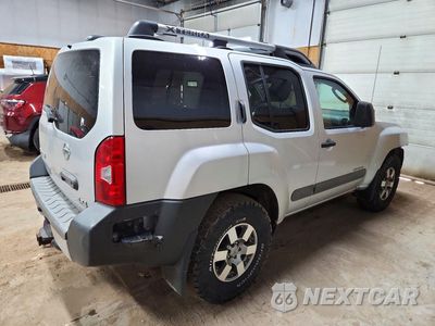 Trzecie zdjęcie samochodu z tyłu: 2010 NISSAN XTERRA X VIN:5N1AN0NW6AC523876 - miniatura