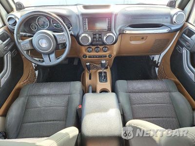 Zdjęcie 8 z 13 samochodu: 2012 JEEP WRANGLER UNLIMITED SAHARA VIN:1C4BJWEG6CL205341 - miniatura
