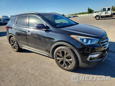 Czwarte zdjęcie samochodu z boku: 2017 HYUNDAI SANTA FE SPORT 2.0T ULTIMATE VIN:5XYZWDLA3HG395024 - miniatura