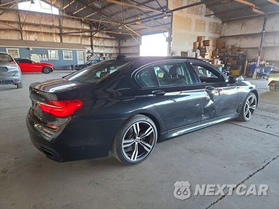Trzecie zdjęcie samochodu z tyłu: 2018 BMW 740 I VIN:WBA7E2C56JG741939 - miniatura