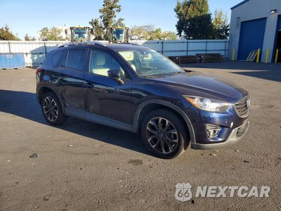 Czwarte zdjęcie samochodu z boku: 2016 MAZDA CX-5 GT VIN:JM3KE2DY8G0880114 - miniatura