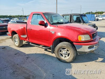 Czwarte zdjęcie samochodu z boku: 1998 FORD F150 VIN:1FTZF08W5WKC33352 - miniatura