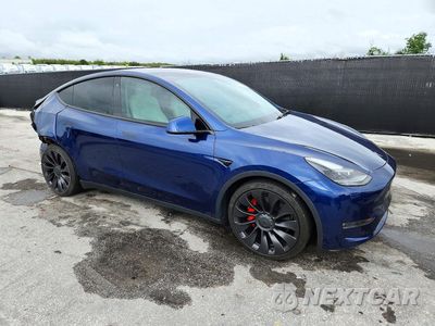 Czwarte zdjęcie samochodu z boku: 2022 TESLA MODEL Y VIN:7SAYGDEF1NF380268 - miniatura