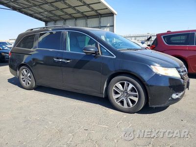 Czwarte zdjęcie samochodu z boku: 2014 HONDA ODYSSEY TOURING VIN:5FNRL5H94EB062251 - miniatura