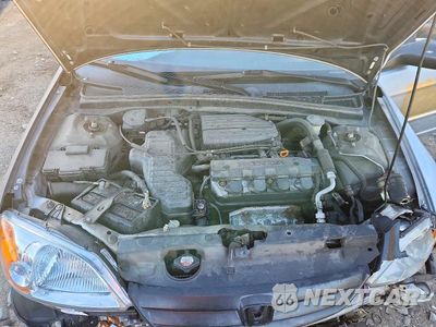 Zdjęcie 11 z 12 samochodu: 2003 HONDA CIVIC LX VIN:2HGES16513H622990 - miniatura