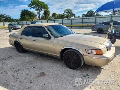 Czwarte zdjęcie samochodu z boku: 1999 MERCURY GRAND MARQUIS GS VIN:2MEFM74W9XX659937 - miniatura