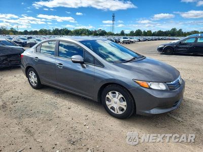 Czwarte zdjęcie samochodu z boku: 2012 HONDA CIVIC HYBRID VIN:JHMFB4F29CS010425 - miniatura