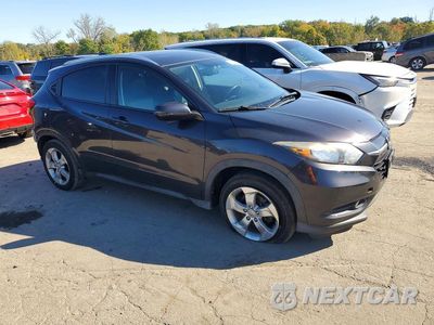 Czwarte zdjęcie samochodu z boku: 2016 HONDA HR-V EXL VIN:3CZRU6H76GM735549 - miniatura