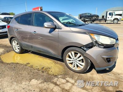 Czwarte zdjęcie samochodu z boku: 2010 HYUNDAI TUCSON LIMITED VIN:KM8JU3AC4AU081738 - miniatura
