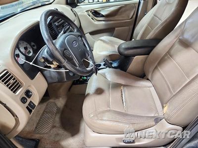 Zdjęcie 7 z 13 samochodu: 2001 FORD ESCAPE XLT VIN:1FMYU03111KF43404 - miniatura