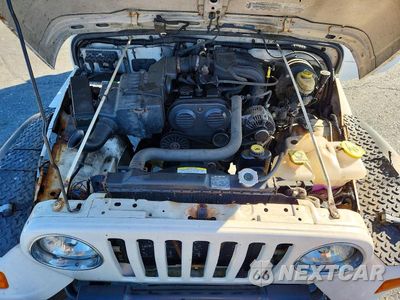 Zdjęcie 11 z 12 samochodu: 2004 JEEP WRANGLER / TJ SE VIN:1J4FA29114P722583 - miniatura