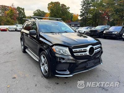 Czwarte zdjęcie samochodu z boku: 2017 MERCEDES-BENZ GLS 550 4MATIC VIN:4JGDF7DE0HA751194 - miniatura