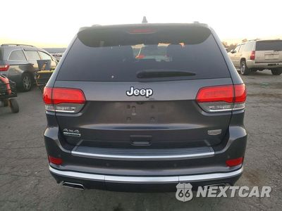 Zdjęcie 6 z 13 samochodu: 2015 JEEP GRAND CHEROKEE SUMMIT VIN:1C4RJFJM3FC732171 - miniatura