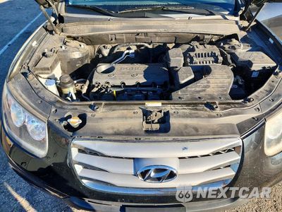 Zdjęcie 12 z 13 samochodu: 2012 HYUNDAI SANTA FE LIMITED VIN:5XYZK3AB8CG128035 - miniatura
