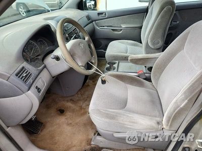 Zdjęcie 7 z 13 samochodu: 2010 TOYOTA SIENNA CE 7-PASSENGER VIN:5TDKK4CC7AS325727 - miniatura