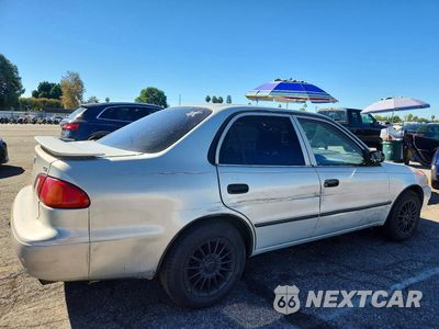 Trzecie zdjęcie samochodu z tyłu: 1999 TOYOTA COROLLA VE VIN:1NXBR12E5XZ247283 - miniatura