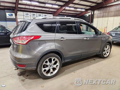 Trzecie zdjęcie samochodu z tyłu: 2014 FORD ESCAPE TITANIUM VIN:1FMCU9J98EUA18194 - miniatura
