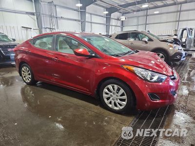 Czwarte zdjęcie samochodu z boku: 2013 HYUNDAI ELANTRA GLS VIN:5NPDH4AE1DH196731 - miniatura