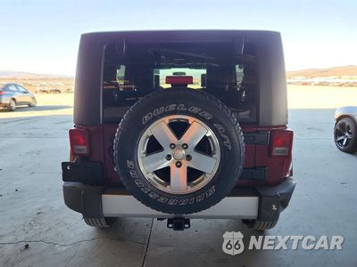 Zdjęcie 6 z 12 samochodu: 2008 JEEP WRANGLER UNLIMITED SAHARA VIN:1J4GA59188L531438 - miniatura
