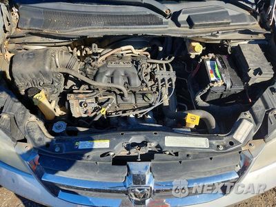 Zdjęcie 12 z 13 samochodu: 2009 DODGE GRAND CARAVAN SXT VIN:2D8HN54159R538671 - miniatura
