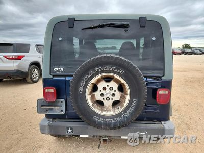 Zdjęcie 6 z 12 samochodu: 2000 JEEP WRANGLER / TJ SPORT VIN:1J4FA49S5YP745357 - miniatura