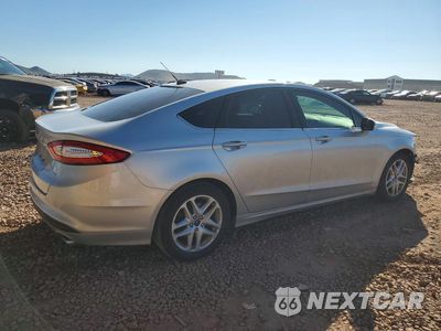 Trzecie zdjęcie samochodu z tyłu: 2016 FORD FUSION SE VIN:3FA6P0H71GR145202 - miniatura