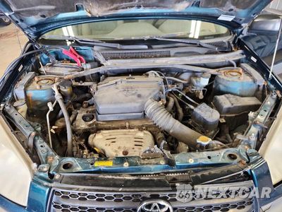 Zdjęcie 12 z 13 samochodu: 2002 TOYOTA RAV4 BASE VIN:JTEHH20V526036569 - miniatura