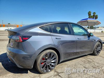 Trzecie zdjęcie samochodu z tyłu: 2022 TESLA MODEL Y VIN:7SAYGDEF0NF553942 - miniatura