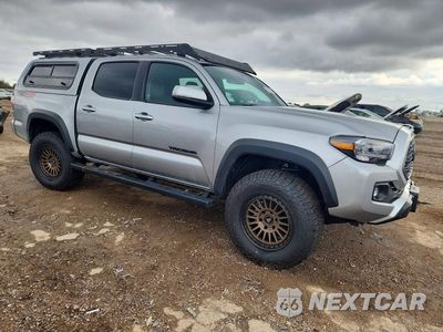 Czwarte zdjęcie samochodu z boku: 2023 TOYOTA TACOMA TRD OFF-ROAD VIN:3TMCZ5AN7PM598993 - miniatura