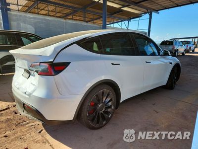 Trzecie zdjęcie samochodu z tyłu: 2023 TESLA MODEL Y VIN:7SAYGDEF6PF588892 - miniatura