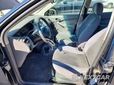 Zdjęcie 7 z 12 samochodu: 2004 FORD FOCUS LX VIN:1FAFP33P44W201800 - miniatura