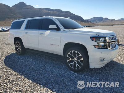 Czwarte zdjęcie samochodu z boku: 2019 CHEVROLET SUBURBAN C1500 LT VIN:1GNSCHKC7KR333825 - miniatura