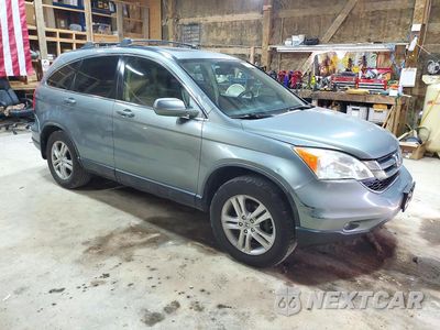 Czwarte zdjęcie samochodu z boku: 2010 HONDA CR-V EXL VIN:JHLRE4H76AC005904 - miniatura