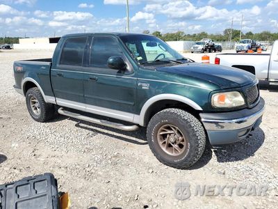 Czwarte zdjęcie samochodu z boku: 2002 FORD F150 SUPERCREW VIN:1FTRW08L52KC75309 - miniatura