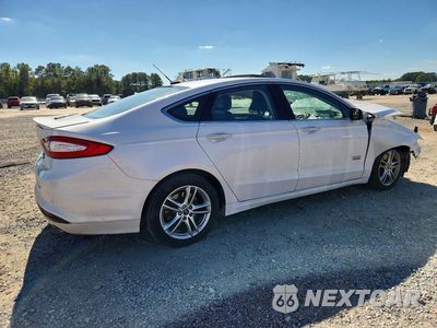 Trzecie zdjęcie samochodu z tyłu: 2016 FORD FUSION TITANIUM PHEV VIN:3FA6P0SU4GR363195 - miniatura