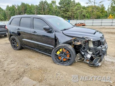 Czwarte zdjęcie samochodu z boku: 2018 JEEP GRAND CHEROKEE TRACKHAWK VIN:1C4RJFN99JC443732 - miniatura
