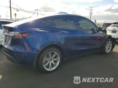 Trzecie zdjęcie samochodu z tyłu: 2023 TESLA MODEL Y VIN:7SAYGDEE0PA090305 - miniatura