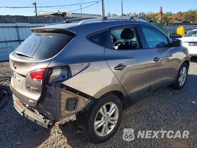 Trzecie zdjęcie samochodu z tyłu: 2013 HYUNDAI TUCSON GLS VIN:KM8JUCAC3DU618619 - miniatura