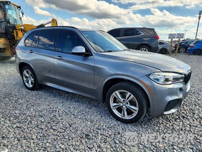 Czwarte zdjęcie samochodu z boku: 2017 BMW X5 XDR40E VIN:5UXKT0C37H0V95302 - miniatura