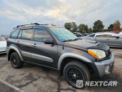 Czwarte zdjęcie samochodu z boku: 2003 TOYOTA RAV4 BASE VIN:JTEGH20V830104640 - miniatura