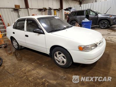 Czwarte zdjęcie samochodu z boku: 1999 TOYOTA COROLLA VE VIN:1NXBR12E1XZ214412 - miniatura