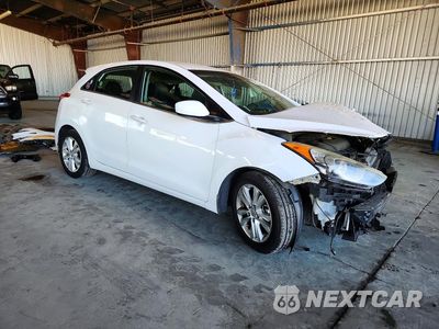 Czwarte zdjęcie samochodu z boku: 2014 HYUNDAI ELANTRA GT BASE VIN:KMHD35LH4EU186094 - miniatura