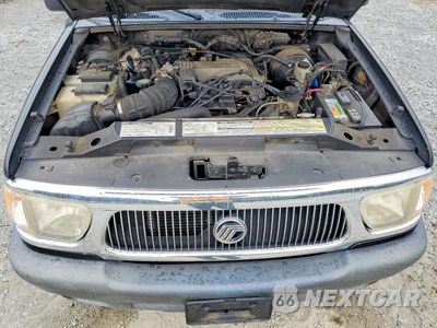 Zdjęcie 12 z 13 samochodu: 1999 MERCURY MOUNTAINEER VIN:4M2ZU52P5XUJ30002 - miniatura