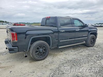 Trzecie zdjęcie samochodu z tyłu: 2017 GMC SIERRA K1500 DENALI VIN:3GTU2PEJ2HG425118 - miniatura