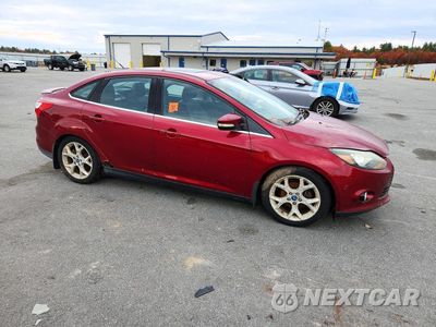 Czwarte zdjęcie samochodu z boku: 2014 FORD FOCUS TITANIUM VIN:1FADP3J24EL215133 - miniatura