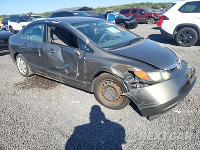 Czwarte zdjęcie samochodu z boku: 2006 HONDA CIVIC LX VIN:1HGFA16556L135841 - miniatura