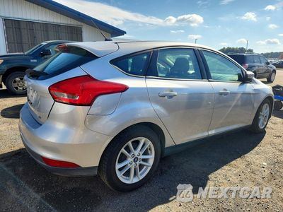 Trzecie zdjęcie samochodu z tyłu: 2018 FORD FOCUS SE VIN:1FADP3K21JL233789 - miniatura