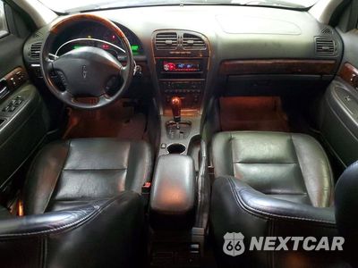 Zdjęcie 8 z 12 samochodu: 2002 LINCOLN LS VIN:1LNHM87A22Y684117 - miniatura
